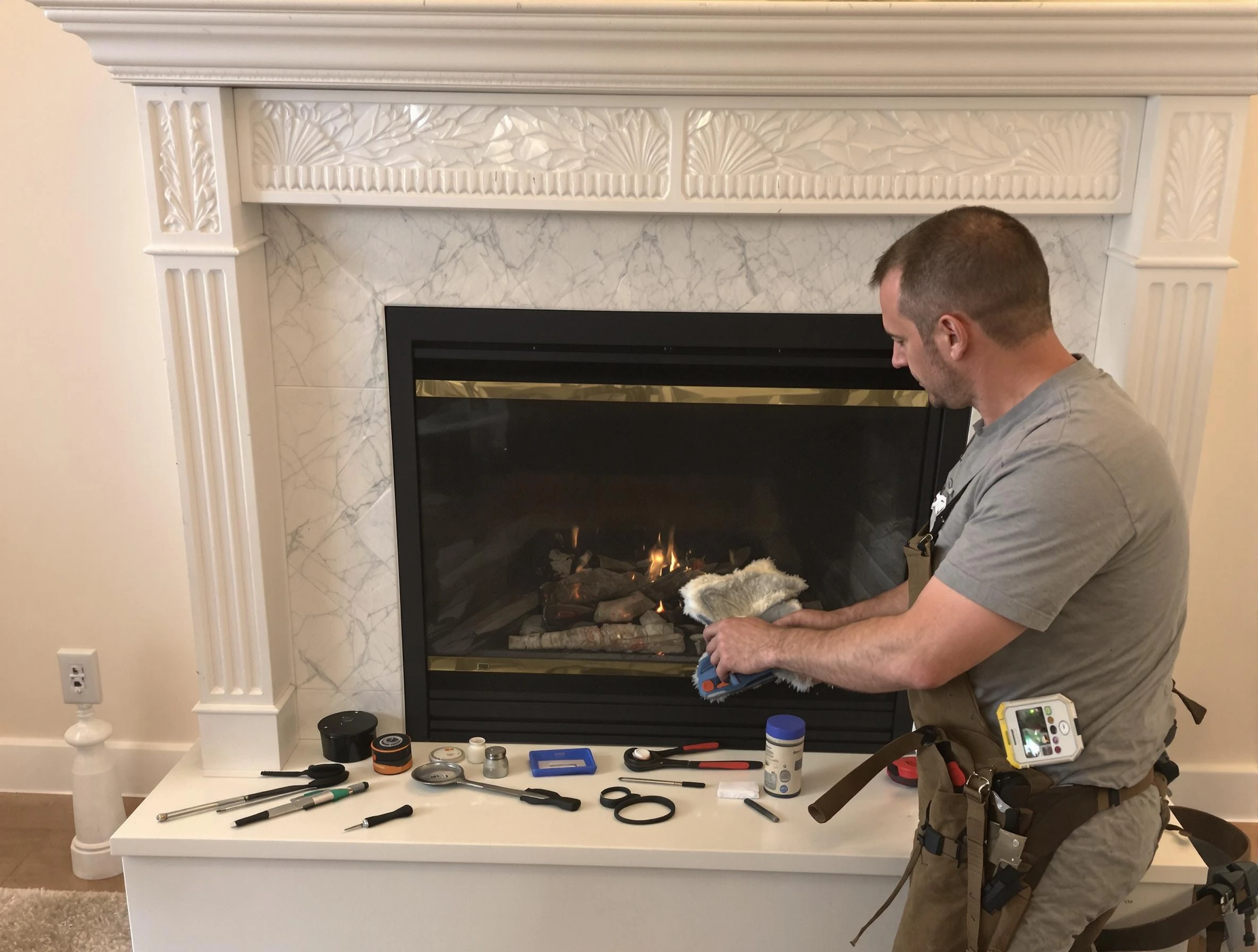 Babylon Chimney Sweep performing fireplace maintenance in Babylon, NY